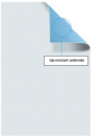Een afbeelding van een Curea Liquimat met een omhoog gekrulde hoek die de blauwe, slip-resistente onderkant onthult, benadrukkend dat de mat veilig op zijn plaats blijft liggen.